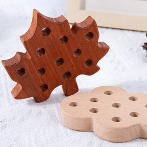 Handcrafted wooden leaf and cloud sorting toy for early childhood education and creativity