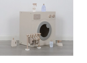 Detail view of Nordic style wooden play laundry set with washer and hanging clothes