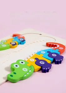 Close-up of wooden crocodile number puzzle showing smooth 3D edges and colorful pieces