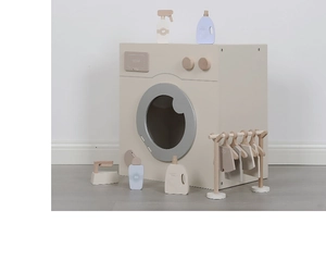 Detail of wooden play washing machine set with laundry accessories in Nordic style