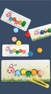 Macro view of colorful wooden beads and a yellow tweezer for toddler fine motor training