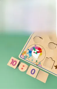 Macro view of wooden Montessori teaching clock and digital blocks for kids early education