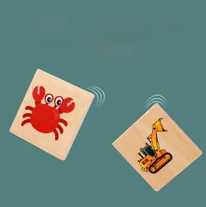 Detail of smooth wooden puzzle blocks with crab and excavator prints for toddlers