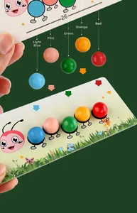 Detailed view of kids placing colorful wooden beads on a caterpillar logic sorting card