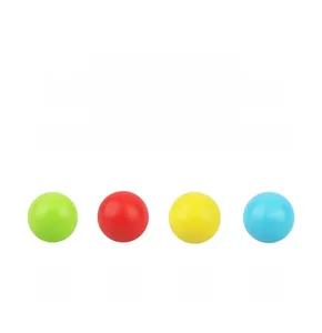 Close-up of colorful wooden balls in green red yellow and blue for early learning