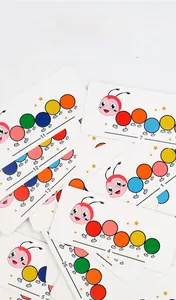 Close-up of 30 colorful caterpillar cognitive cards for kids color and number learning