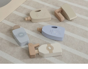 Detailed macro view of 5-piece Nordic wooden toy laundry set with soft Morandi colors