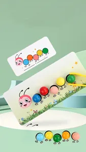 Macro detail of caterpillar sorting toy with colorful wooden beads and a yellow tweezer