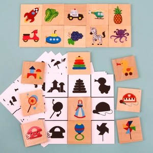 Wooden shadow matching puzzle for kids featuring colorful cartoon shapes and cards