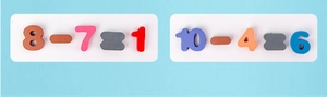 Dettaglio di numeri colorati e puzzle di sottrazione per l'educazione matematica infantile