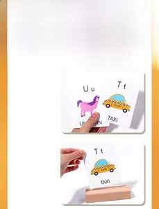Macro view of wooden slot base and dual-sided letter learning cards for kids