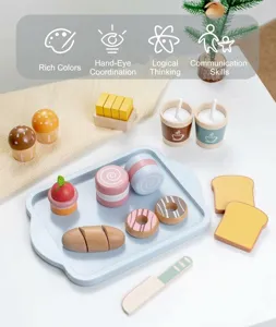 Detail of wooden afternoon tea play set with donuts and coffee cups in Morandi colors