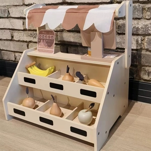 Nordic wooden play supermarket stall with striped awning and toy fruit accessories