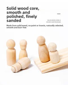 Detail of natural wood toy figures with smooth polished finish and clear grain texture