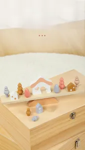 Detail of Morandi-colored wooden balancing blocks with trees and balance beam set