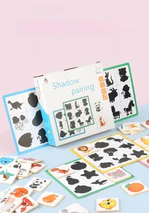 Detail view of wooden shadow pairing puzzle pieces and matching game boards for kids