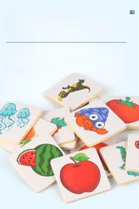Detail of wooden shadow matching cards with colorful animal and fruit illustrations for kids