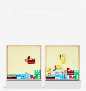 Detail showing colorful wooden vehicle puzzle pieces being assembled in a wooden tray