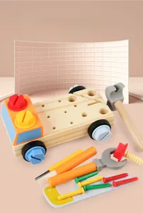 Detail view of wooden car assembly toy with hammer, wrench and plastic screws