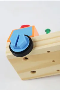 Detail of hand-polished wooden base and colorful nut accessories for kids puzzle toy