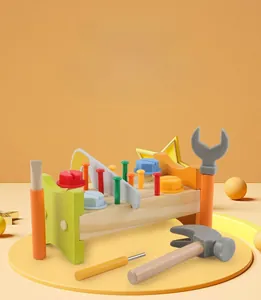 Detail of wooden tool workbench with colorful screws, hammers and screwdrivers for kids