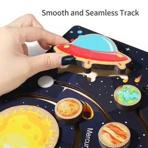 Puzzle système solaire en bois avec planètes et curseur OVNI pour l'apprentissage spatial