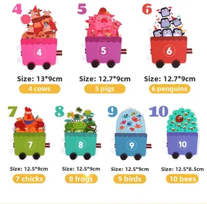 Close-up of educational number matching cards with colorful animals and puzzle train graphics