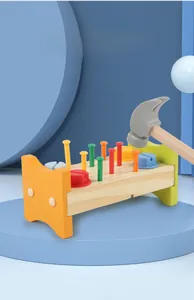 Macro detail of kids wooden hammering tool bench for fine motor skills training