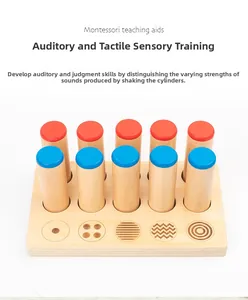 Detail of wooden Montessori sensory sound cylinders with textured tactile symbols on base