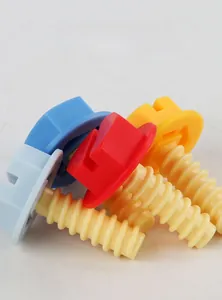 Close-up of colorful large nut and bolt toys for children fine motor skills training