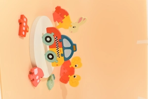 Detailed close-up of a colorful 3D wooden animal puzzle for kids early learning