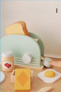 Detailed set of wooden toaster toy with toast, butter, strawberry jam and fried egg