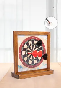 Close-up of safety magnetic dart head and target board with traditional wood frame
