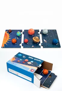 Macro detail of wooden solar system puzzle pieces and 3D planet models for kids