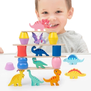Kids dinosaur balance stacking blocks game with colorful wooden pieces for coordination
