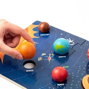 Wooden solar system puzzle with solid wood planet spheres for early Montessori learning