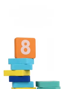Macro detail of stacked colorful wooden arithmetic blocks with white printed numbers