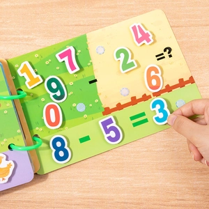 Educational math busy book for kids with subtraction puzzles and colorful number stickers