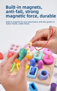 Detail of magnetic wooden fishing toy showing magnet rod picking up colorful small fish