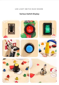 Macro details of children's wooden busy board with LED switches and Christmas motifs