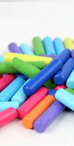 Close-up of colorful wooden math counting sticks with non-toxic water-based paint finish