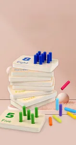 Macro detail of wooden math counting sticks and colorful number blocks for kids