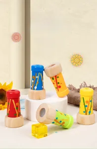 Set of five colorful wooden kaleidoscopes with geometric star patterns on display stands
