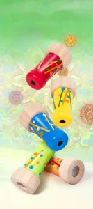 Classic wooden kaleidoscope toys with colorful geometric patterns and optical imaging