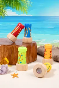 Close-up of a classic wooden kaleidoscope for children with colorful star and dot patterns