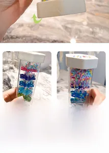 Detail showing the cartoon cloud design and colorful beads inside the rainmaker toy