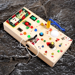 Christmas wooden busy board with LED lights and interactive power switches for toddlers