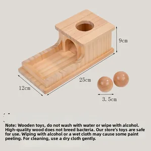 Detailed size specifications of the Montessori wooden object permanence box and wooden balls
