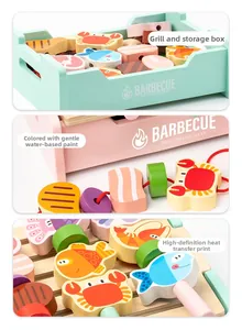 Detail of wooden barbecue toy set with colorful magnetic food pieces and grill storage box
