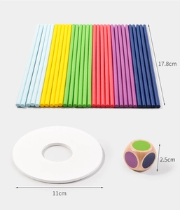 Detailed dimensions of wooden balancing toy including sticks, ring base, and dice
